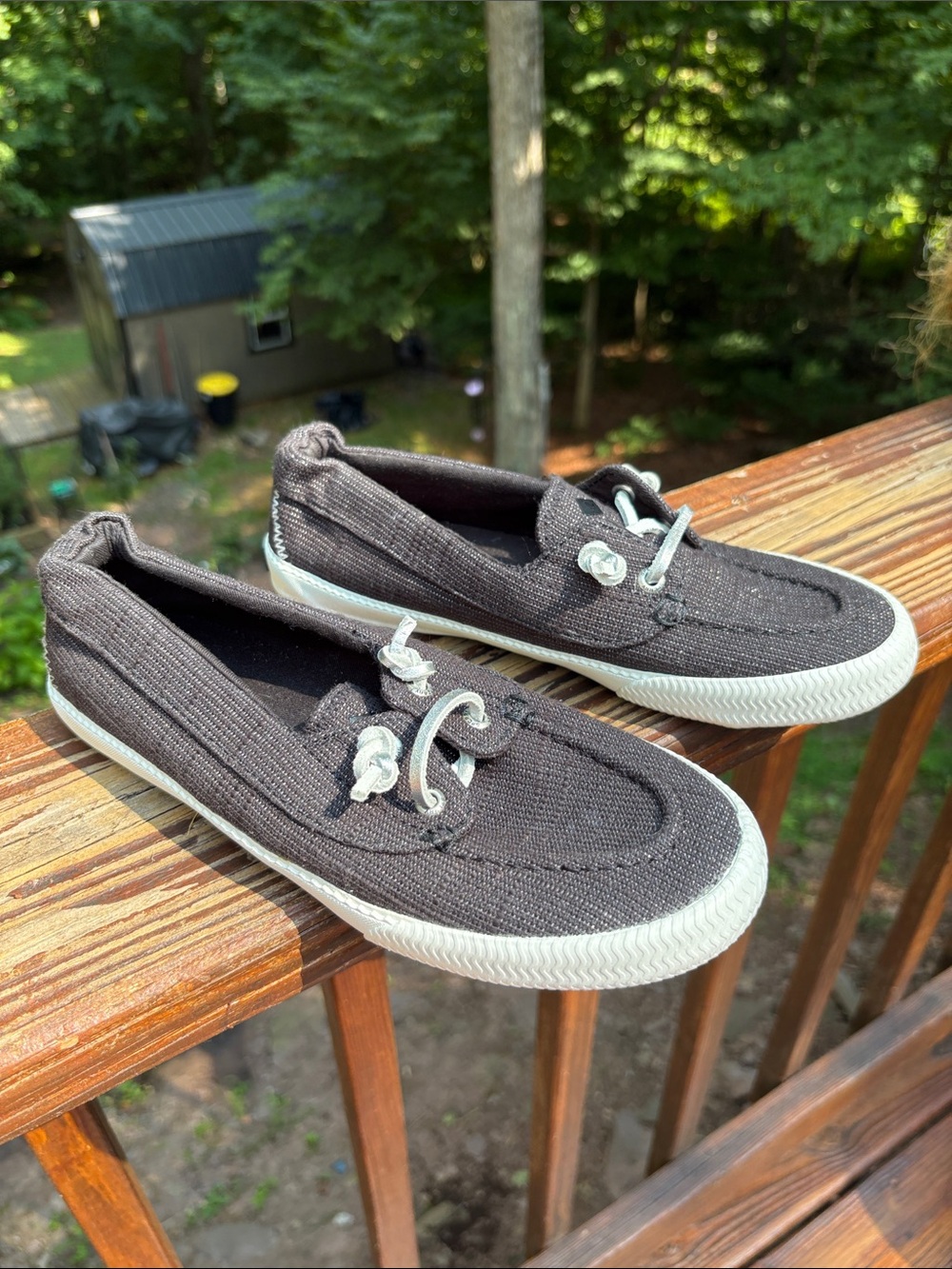 Sperry woman’s Black Canvas Boat Shoes with White Accents